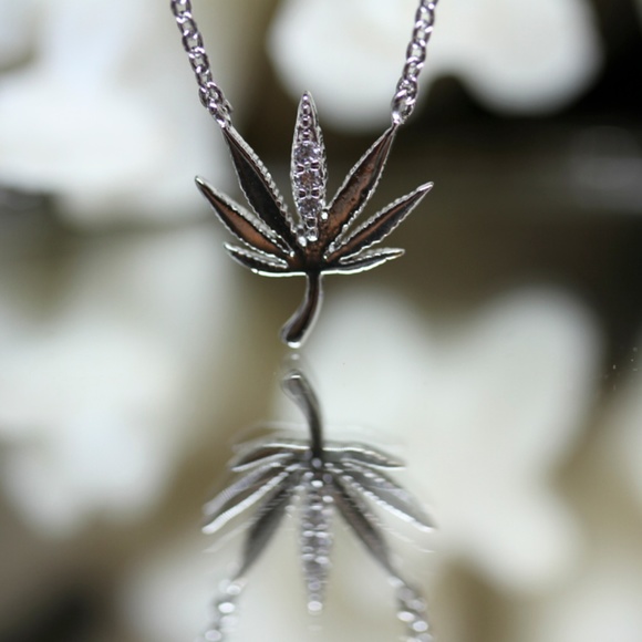 Jenna Jameson Jewelry - 14kt White Gold Dipped Swarovski Cannabis Leaf